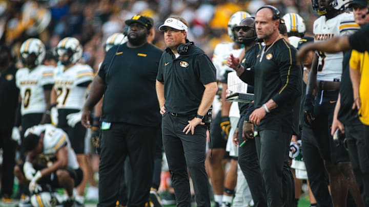 Oct 26, 2024; Tuscaloosa, Alabama, USA; Missouri Tigers head coach Eliah Drinkwitz looks on from the sideline during the fourth quarter against the Alabama Crimson Tide at Bryant-Denny Stadium. Mandatory Credit: Will McLelland-Imagn Images Oct 26, 2024; Tuscaloosa, Alabama, USA; Missouri Tigers head coach Eliah Drinkwitz looks on from the sideline during the fourth quarter against the Alabama Crimson Tide at Bryant-Denny Stadium. Mandatory Credit: Will McLelland-Imagn Images