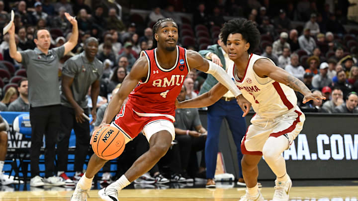 Guard Josh Omojafo, shown here in last season's NCAA tournament game against Alabama, committed to USF from Robert Morris.
