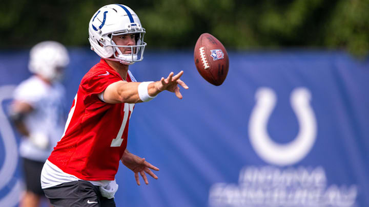 Jun 12, 2025; Indianapolis, IN, USA; Indianapolis Colts quarterback Daniel Jones (17) pitches a ball during training camp at the Farm Bureau Football complex. Mandatory Credit: Marc Lebryk-Imagn Images Jun 12, 2025; Indianapolis, IN, USA; Indianapolis Colts quarterback Daniel Jones (17) pitches a ball during training camp at the Farm Bureau Football complex. Mandatory Credit: Marc Lebryk-Imagn Images