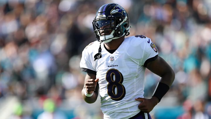 Nov 27, 2022; Jacksonville, Florida, USA;  Baltimore Ravens quarterback Lamar Jackson (8) runs to