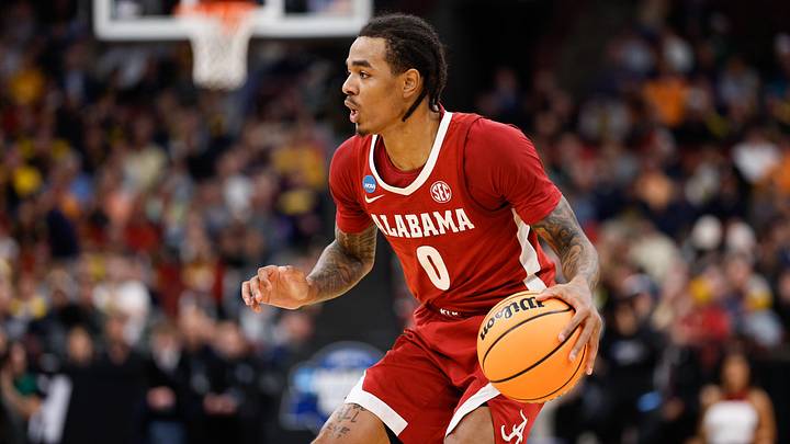 Mar 27, 2026; Chicago, IL, USA; Alabama Crimson Tide guard Labaron Philon Jr. (0) controls the ball in the first half against the Michigan Wolverines during a Sweet Sixteen game of the Midwest Regional of the men's 2026 NCAA Tournament at United Center. Mandatory Credit: Kamil Krzaczynski-Imagn Images Mar 27, 2026; Chicago, IL, USA; Alabama Crimson Tide guard Labaron Philon Jr. (0) controls the ball in the first half against the Michigan Wolverines during a Sweet Sixteen game of the Midwest Regional of the men's 2026 NCAA Tournament at United Center. Mandatory Credit: Kamil Krzaczynski-Imagn Images