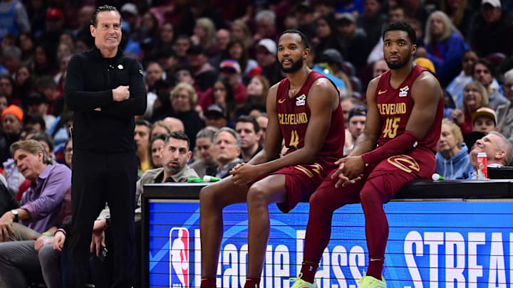 Apr 2, 2025; Cleveland, Ohio, USA; Cleveland Cavaliers forward Evan Mobley (4) and guard Donovan Mitchell (45) wait along side head coach Kenny Atkinson to enter the game during the first half against the New York Knicks at Rocket Arena. Mandatory Credit: Ken Blaze-Imagn Images Apr 2, 2025; Cleveland, Ohio, USA; Cleveland Cavaliers forward Evan Mobley (4) and guard Donovan Mitchell (45) wait along side head coach Kenny Atkinson to enter the game during the first half against the New York Knicks at Rocket Arena. Mandatory Credit: Ken Blaze-Imagn Images