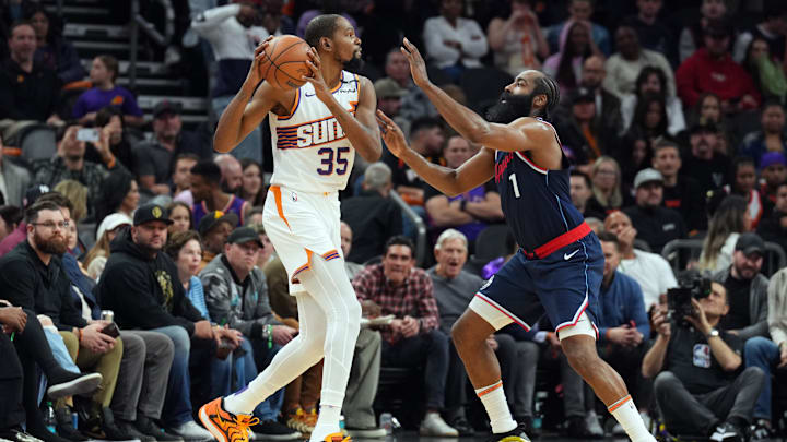 Jan 27, 2025; Phoenix, Arizona, USA; LA Clippers guard James Harden (1) guards Phoenix Suns forward Kevin Durant (35) during the second half at Footprint Center. Mandatory Credit: Joe Camporeale-Imagn Images Jan 27, 2025; Phoenix, Arizona, USA; LA Clippers guard James Harden (1) guards Phoenix Suns forward Kevin Durant (35) during the second half at Footprint Center. Mandatory Credit: Joe Camporeale-Imagn Images