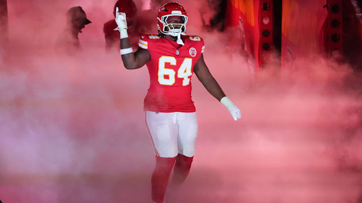 Nov 4, 2024; Kansas City, Missouri, USA; Kansas City Chiefs offensive tackle Wanya Morris (64) is introduced against the Tampa Bay Buccaneers prior to a game at GEHA Field at Arrowhead Stadium. Mandatory Credit: Denny Medley-Imagn Images
