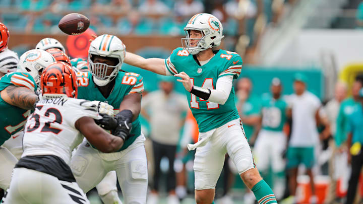 Miami Dolphins quarterback Quinn Ewers (14) runs the ball during the third quarter against the Cincinnati Bengals at Hard Rock Stadium.