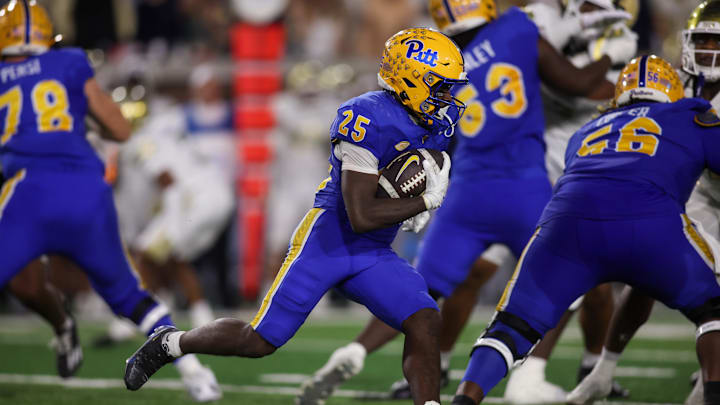 Nov 22, 2025; Atlanta, Georgia, USA; Pittsburgh Panthers running back Ja'Kyrian Turner (25) runs the ball against the Georgia Tech Yellow Jackets in the second quarter at Bobby Dodd Stadium at Hyundai Field. Mandatory Credit: Brett Davis-Imagn Images