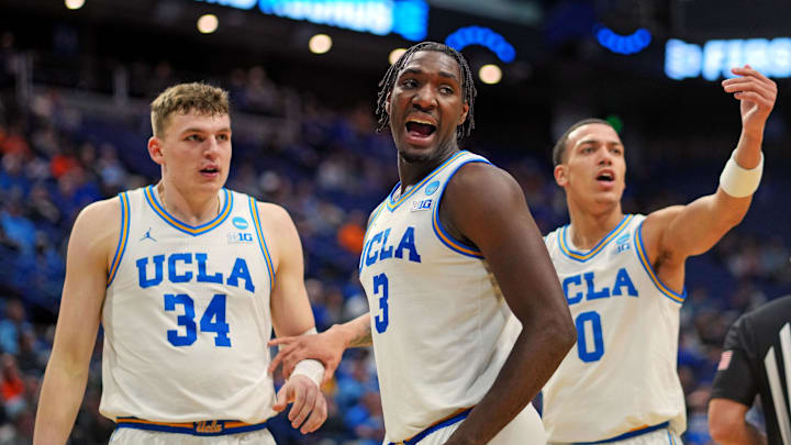 Mar 20, 2025; Lexington, KY, USA;  UCLA Bruins guard Eric Dailey Jr. (3) reacts during the second half against the Utah State Aggies in the first round of the NCAA Tournament at Rupp Arena. Mandatory Credit: Aaron Doster-Imagn Images