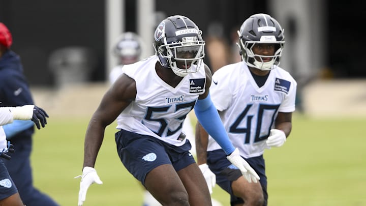 May 10, 2025; Nashville, TN, USA; Tennessee Titans outside linebacker Oluwafemi Oladejo (53) goes through drills during Rookie Mini Camp at Saint Thomas Sports Park. Mandatory Credit: Steve Roberts-Imagn Images May 10, 2025; Nashville, TN, USA; Tennessee Titans outside linebacker Oluwafemi Oladejo (53) goes through drills during Rookie Mini Camp at Saint Thomas Sports Park. Mandatory Credit: Steve Roberts-Imagn Images