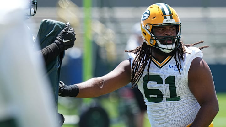 Green Bay Packers offensive lineman Lecitus Smith (61) is shown during organized team activities Wednesday, May 29, 2024 in Green Bay, Wisconsin.