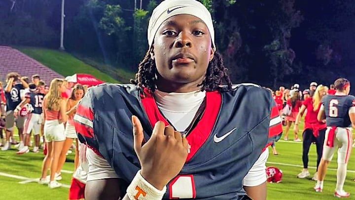 Jamyan Theodore showing off some Tennessee gear following win in season opener.