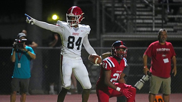 Brophy Prep wide receiver Daylen Sharper (84) celebrates a first down against Centennial during a game at Centennial High School on Sept. 13, 2024.