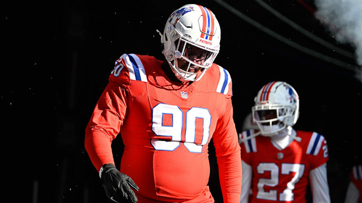 Dec 1, 2024; Foxborough, Massachusetts, USA; New England Patriots defensive tackle Christian Barmore (90) walks out of the player's tunnel before a game against the Indianapolis Colts at Gillette Stadium.