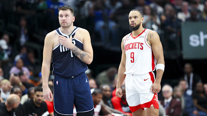 Oct 31, 2024; Dallas, Texas, USA;  Dallas Mavericks guard Luka Doncic (77) and Houston Rockets forward Dillon Brooks (9) during the first half at American Airlines Center. Mandatory Credit: Kevin Jairaj-Imagn Images