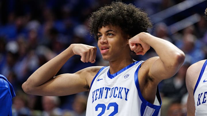 Oct 24, 2025; Lexington, KY, USA; Kentucky Wildcats forward Braydon Hawthorne (22) gestures in celebration from the bench during the second half against the Purdue Boilermakers at Rupp Arena at Central Bank Center. Mandatory Credit: Jordan Prather-Imagn Images