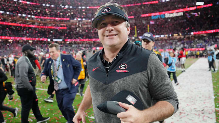 Jan 9, 2023; Inglewood, CA, USA; Georgia Bulldogs head coach Kirby Smart runs off the field after winning the CFP national championship game against the TCU Horned Frogs at SoFi Stadium. Mandatory Credit: Kirby Lee-Imagn Images