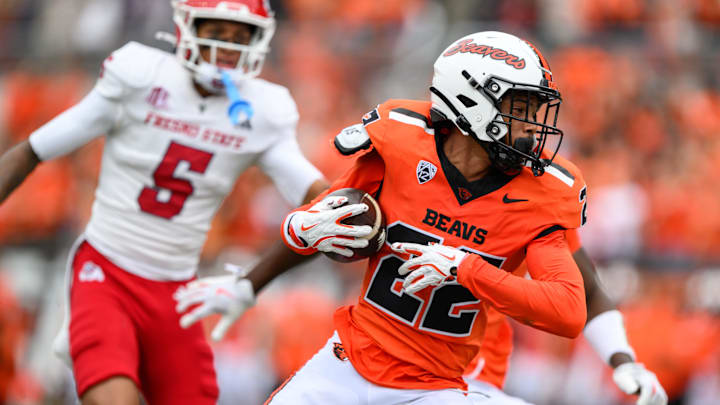 Sep 6, 2025; Corvallis, Oregon, USA; Oregon State Beavers defensive back Jalil Tucker (22) intercepts a pass intended for Fresno State Bulldogs wide receiver Josiah Freeman (5) during the second quarter at Reser Stadium. Mandatory Credit: Craig Strobeck-Imagn Images