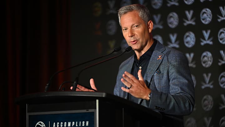 Oct 8, 2025; Charlotte, NC, USA; Virginia head coach Ryan Odom answers questions from the media at The Hilton Charlotte Uptown. Mandatory Credit: William Howard-Imagn Images Oct 8, 2025; Charlotte, NC, USA; Virginia head coach Ryan Odom answers questions from the media at The Hilton Charlotte Uptown. Mandatory Credit: William Howard-Imagn Images