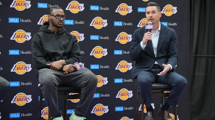 Jul 2, 2024; El Segundo, CA, USA: Los Angeles Lakers coach JJ Redick (right) and second-round draft pick Bronny James at a press conference at the UCLA Health Training Center. Mandatory Credit: Kirby Lee-Imagn Images