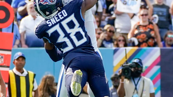 Indianapolis Colts wide receiver Michael Pittman Jr. (11) receives a pass for a touchdown past Tennessee Titans cornerback L'Jarius Sneed (38) during the fourth quarter at Nissan Stadium in Nashville, Tenn., Sunday, Oct. 13, 2024.