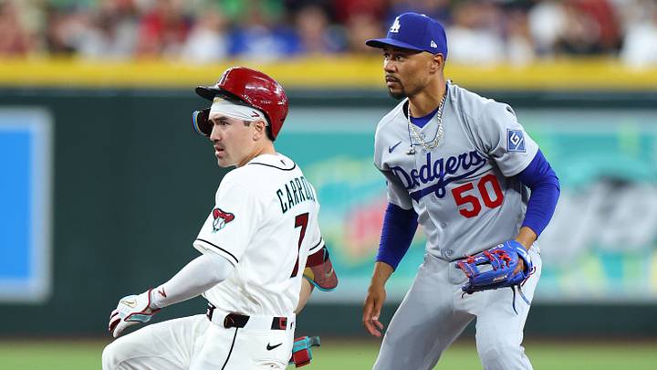Jun 4, 2026; Phoenix, Arizona, USA; Arizona Diamondbacks right fielder Corbin Carroll (7) slides after hitting a double against Los Angeles Dodgers pitcher Justin Wrobleski (70) in the first inning at Chase Field. Mandatory Credit: Anna Carrington-Imagn Images Jun 4, 2026; Phoenix, Arizona, USA; Arizona Diamondbacks right fielder Corbin Carroll (7) slides after hitting a double against Los Angeles Dodgers pitcher Justin Wrobleski (70) in the first inning at Chase Field. Mandatory Credit: Anna Carrington-Imagn Images