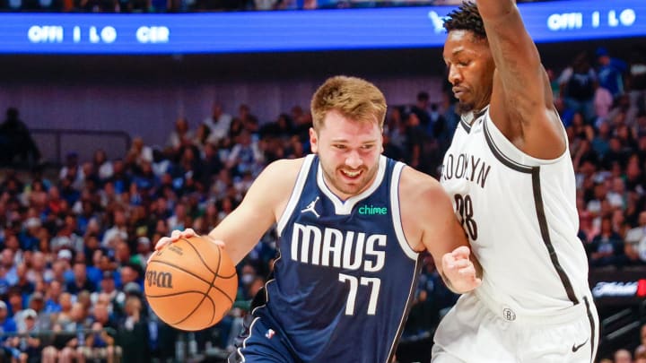 Oct 27, 2023; Dallas, Texas, USA; Dallas Mavericks guard Luka Doncic (77) drives on Brooklyn Nets forward Dorian Finney-Smith (28) during the second quarter at American Airlines Center. Mandatory Credit: Andrew Dieb-USA TODAY Sports
