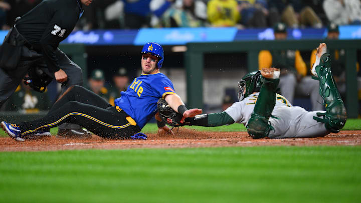 Athletics catcher Shea Langeliers (right) tags Seattle Mariners catcher Mitch Garver out at home on March 28 at T-Mobile Park. Athletics catcher Shea Langeliers (right) tags Seattle Mariners catcher Mitch Garver out at home on March 28 at T-Mobile Park.