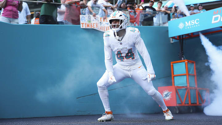 Miami Dolphins linebacker Chop Robinson (44) enters the field prior to a game against the Los Angeles Chargers at Hard Rock Stadium during the 2025 season.