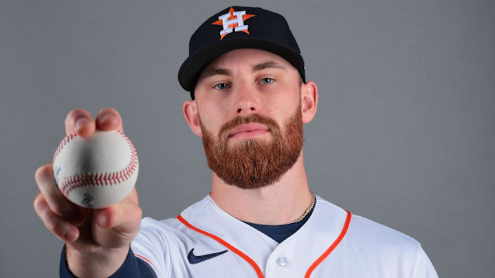 Houston Astros pitcher Mike Burrows (50) poses for a photo during media day.