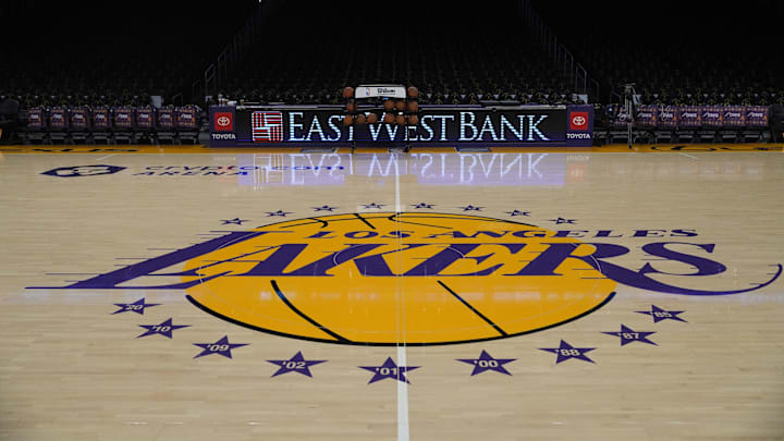 Dec 18, 2023; Los Angeles, California, USA; The Los Angeles Lakers logo at center court at the Crypto.com Arena. Mandatory Credit: Kirby Lee-Imagn Images