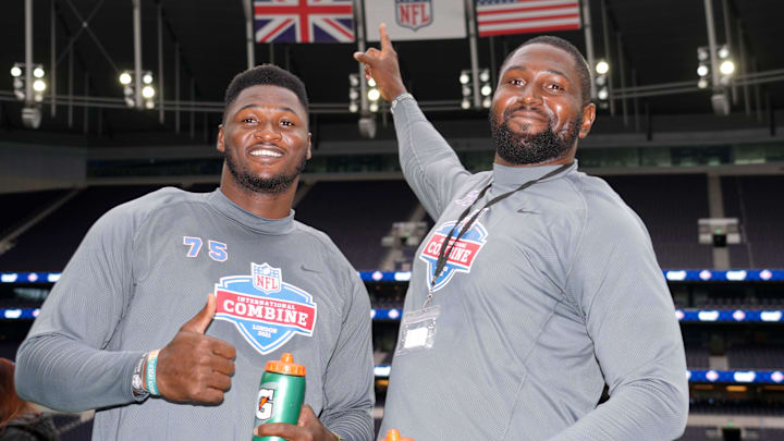 Oct 12, 2021; London, United Kingdom; Haggai Chisom Noubuisi of Nigeria (75) and Mbaeteka Chigbo Roy of Nigeria (76) pose during the NFL International Combine at Tottenham Hotspur Stadium. Mandatory Credit: Kirby Lee-USA TODAY Sports