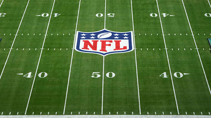 Feb 12, 2023; Glendale, Arizona, USA;The NFL shield and Kansas City Chiefs logos on the field at