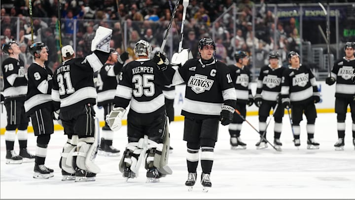 Apr 21, 2025; Los Angeles, California, USA; LA Kings center Anze Kopitar (11) salutes the crowd after game one of the first round of the 2025 Stanley Cup Playoffs against the Edmonton Oilers at Crypto.com Arena. Mandatory Credit: Kirby Lee-Imagn Images