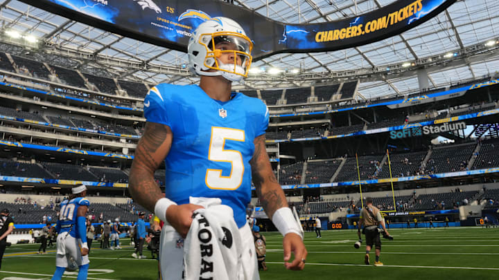 Los Angeles Chargers QB Trey Lance leaves the field after the game against the New Orleans Saints at SoFi Stadium.