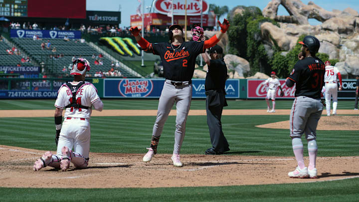 Baltimore Orioles shortstop Gunnar Henderson (2) celebrates after hitting a two-run home run in the sixth inning as Los Angeles Angels catcher Logan O'Hoppe (14) and relief pitcher Connor Brogdon (75) and Orioles center fielder Cedric Mullins (31)watch at Angel Stadium on May 11.