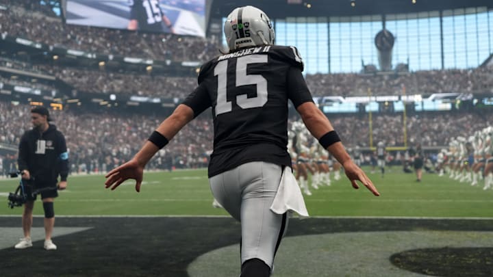 Sep 22, 2024; Paradise, Nevada, USA; Las Vegas Raiders quarterback Gardner Minshew (15) enters the field before the game against the Carolina Panthers at Allegiant Stadium. Mandatory Credit: Kirby Lee-Imagn Images