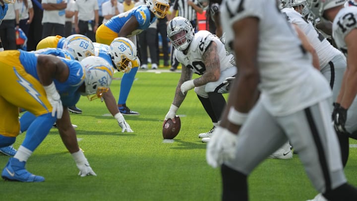 Sep 11, 2022; Inglewood, California, USA; Las Vegas Raiders center Andre James (68) snaps the ball against the Los Angeles Chargers in the second half at SoFi Stadium. Mandatory Credit: Kirby Lee-Imagn Images
