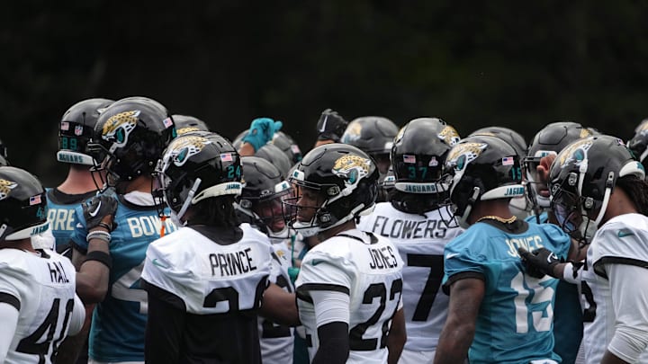 Oct 16, 2024; Watford, United Kingdom; Jacksonville Jaguars players huddle during practice at The Grove. Mandatory Credit: Kirby Lee-Imagn Images