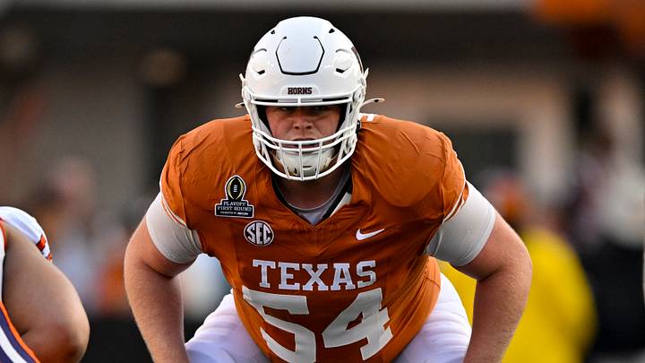 Texas Longhorns offensive lineman Cole Hutson (54) in action during the game between the Texas Longhorns and the Clemson Tigers in the CFP National Playoff First Round at Darrell K Royal-Texas Memorial Stadium.