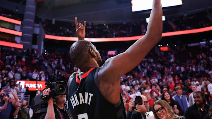 Jan 5, 2026; Houston, Texas, USA; Houston Rockets forward Kevin Durant (7) celebrates with fans after  defeating the Phoenix Suns at Toyota Center. Mandatory Credit: Thomas Shea-Imagn Images