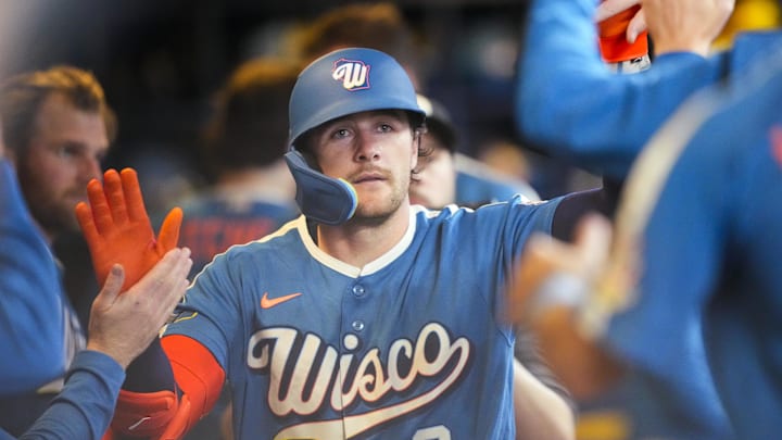 Apr 12, 2026; Milwaukee, Wisconsin, USA;  Milwaukee Brewers second baseman Brice Turang (2) celebrates in the dugout after hitting a home run during the fifth inning against the Washington Nationals at American Family Field. Mandatory Credit: Jeff Hanisch-Imagn Images