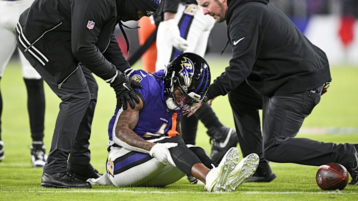 Jan 4, 2025; Baltimore, Maryland, USA; Baltimore Ravens wide receiver Zay Flowers (4) reacts after a tackle during the first quarter against the Cleveland Browns at M&T Bank Stadium. Mandatory Credit: Tommy Gilligan-Imagn Images