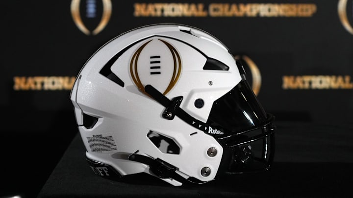 Jan 19, 2025; Atlanta, GA, USA; A College Football Playoff logo helmet at a press conference at The Westin Peachtree Plaza, Savannah Ballroom. Jan 19, 2025; Atlanta, GA, USA; A College Football Playoff logo helmet at a press conference at The Westin Peachtree Plaza, Savannah Ballroom.