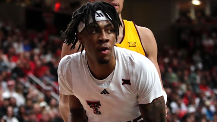 Feb 12, 2025; Lubbock, Texas, USA;  Texas Tech Red Raiders forward JT Toppin (15) looks to shoot against Arizona State Sun Devils forward Basheer Jihad (8) in the first half at United Supermarkets Arena. Mandatory Credit: Michael C. Johnson-Imagn Images