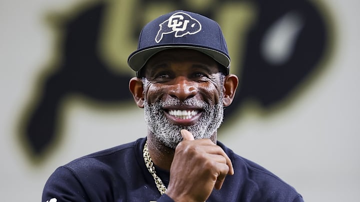 Apr 4, 2025; Boulder, CO, USA; Colorado Buffaloes head coach Deion Sanders watches as his players go through drills at the University of Colorado NFL Showcase at the CU Indoor Practice Facility. Mandatory Credit: Michael Ciaglo-Imagn Images Apr 4, 2025; Boulder, CO, USA; Colorado Buffaloes head coach Deion Sanders watches as his players go through drills at the University of Colorado NFL Showcase at the CU Indoor Practice Facility. Mandatory Credit: Michael Ciaglo-Imagn Images