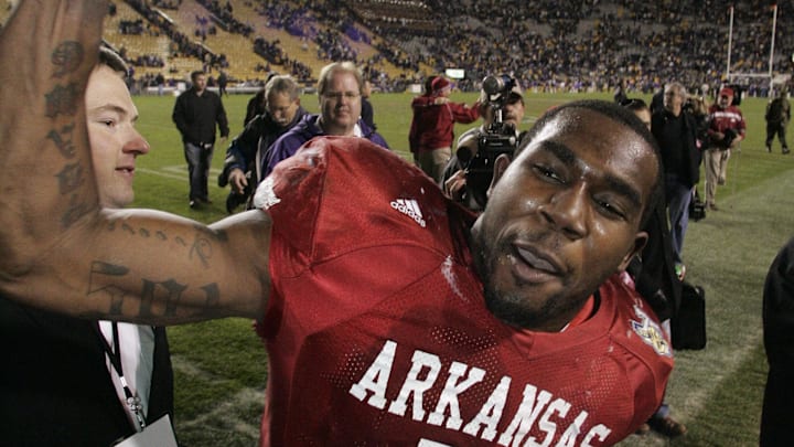 Nov. 23, 2007; Baton Rouge, LA, USA; Arkansas Razorbacks tailback Darren McFadden (5) celebrates their 50-48 triple overtime victory over the top ranked LSU Tigers at Tiger Stadium. Mandatory Credit: John David Mercer-Imagn Images Copyright © 2007 John David Mercer