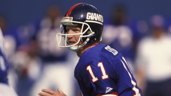 Sep 13, 1992; East Rutherford, NJ, USA; FILE PHOTO; New York Giants quarterback (11) Phil Simms in action against the Dallas Cowboys at Giants Stadium.  