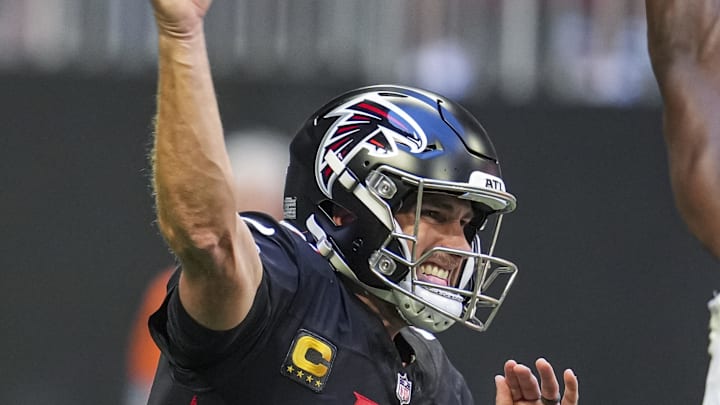 Oct 20, 2024; Atlanta, Georgia, USA; Atlanta Falcons quarterback Kirk Cousins (18) passes the ball against the Seattle Seahawks at Mercedes-Benz Stadium. Mandatory Credit: Dale Zanine-Imagn Images