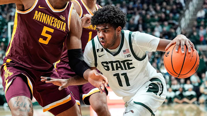 Michigan State guard Jase Richardson (11) dribbles against Minnesota guard Femi Odukale (11) during the second half at Breslin Center in East Lansing on Tuesday, Jan. 28, 2025.