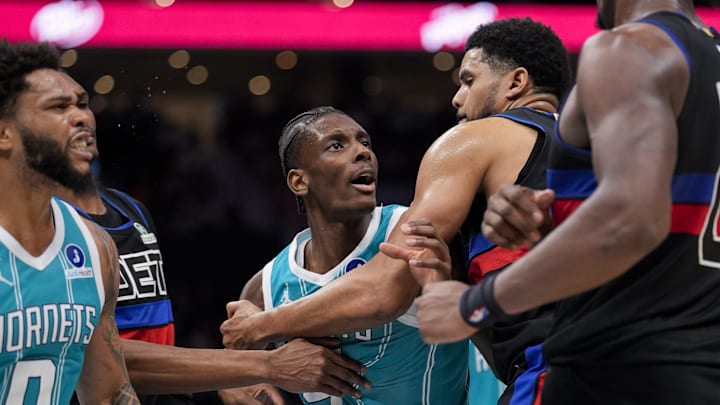 Feb 9, 2026; Charlotte, North Carolina, USA; Charlotte Hornets forward Miles Bridges (0) and forward Moussa Diabaté (14) get into a fight and would be ejected along with Detroit Pistons center Jalen Duren (0) and forward/center Isaiah Stewart (28) during the second half at Spectrum Center. Mandatory Credit: Jim Dedmon-Imagn Images
