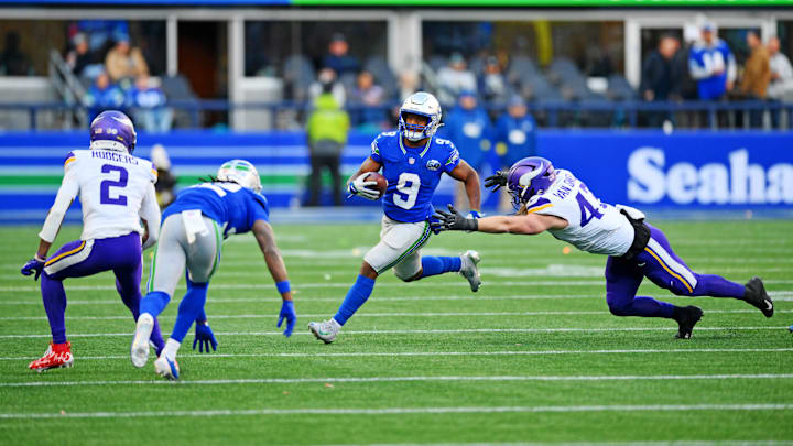 Nov 30, 2025; Seattle, Washington, USA; Seattle Seahawks running back Kenneth Walker III (9) runs the ball during the second half against Minnesota Vikings linebacker Andrew Van Ginkel (43) at Lumen Field. Mandatory Credit: Steven Bisig-Imagn Images Nov 30, 2025; Seattle, Washington, USA; Seattle Seahawks running back Kenneth Walker III (9) runs the ball during the second half against Minnesota Vikings linebacker Andrew Van Ginkel (43) at Lumen Field. Mandatory Credit: Steven Bisig-Imagn Images